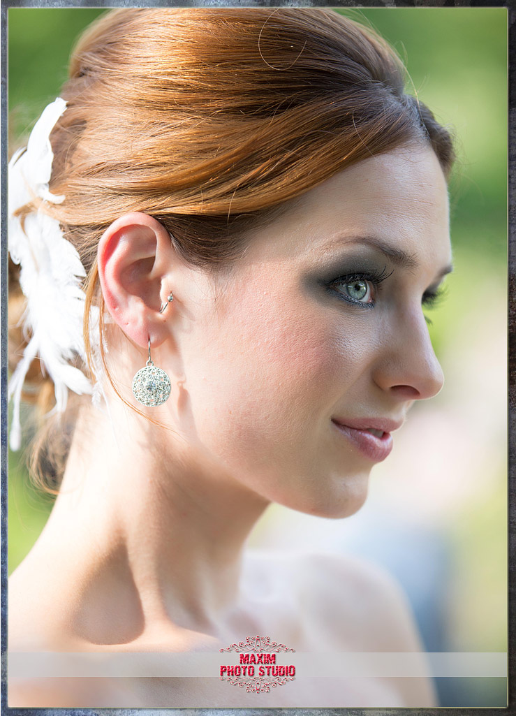 Maxim Photo Studio captured the bride at Ault Park in Cincinnati